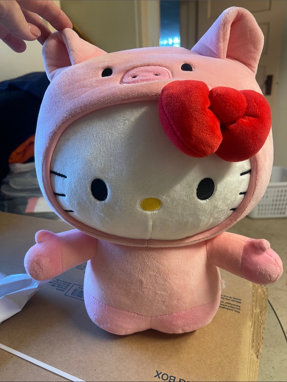 Sanrio Hello Kitty Plush in Pink Pig Outfit with Red Bow